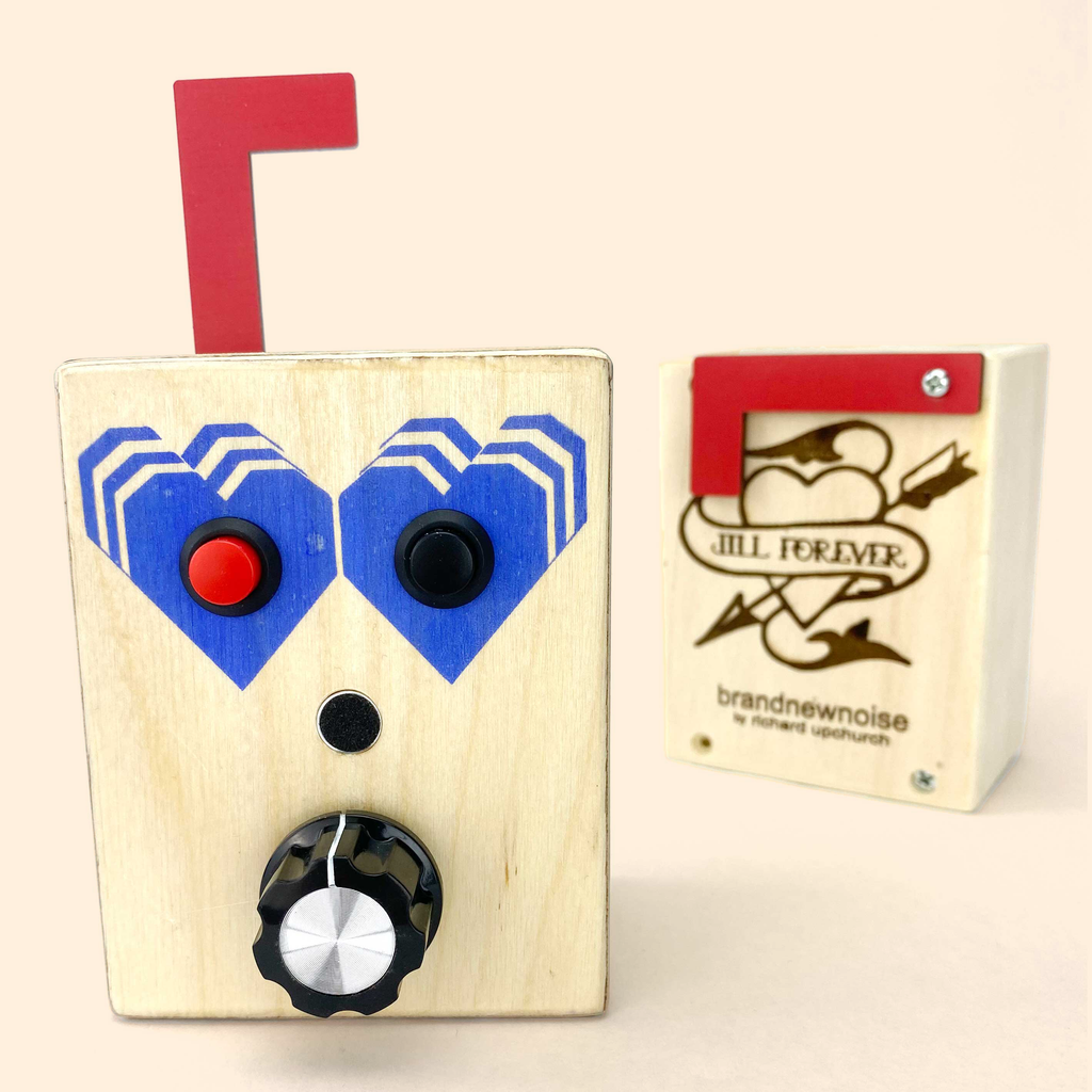 BrandNewNoise musical toy with blue hearts design, red mailbox flag, and  custom tattoo